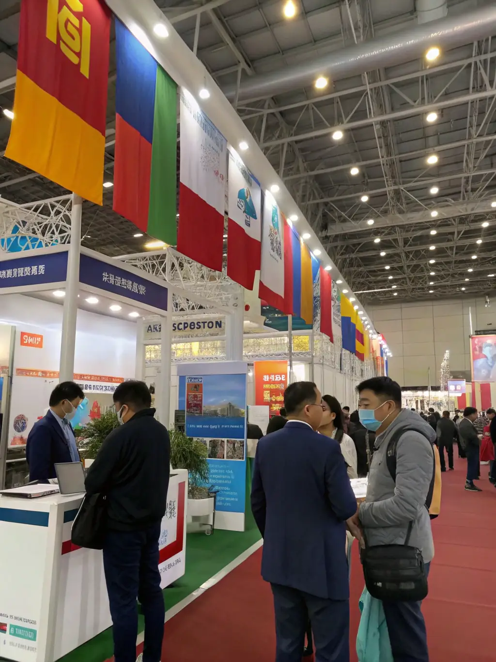 A photograph of a well-organised trade show, with various booths showcasing different businesses and attendees networking.